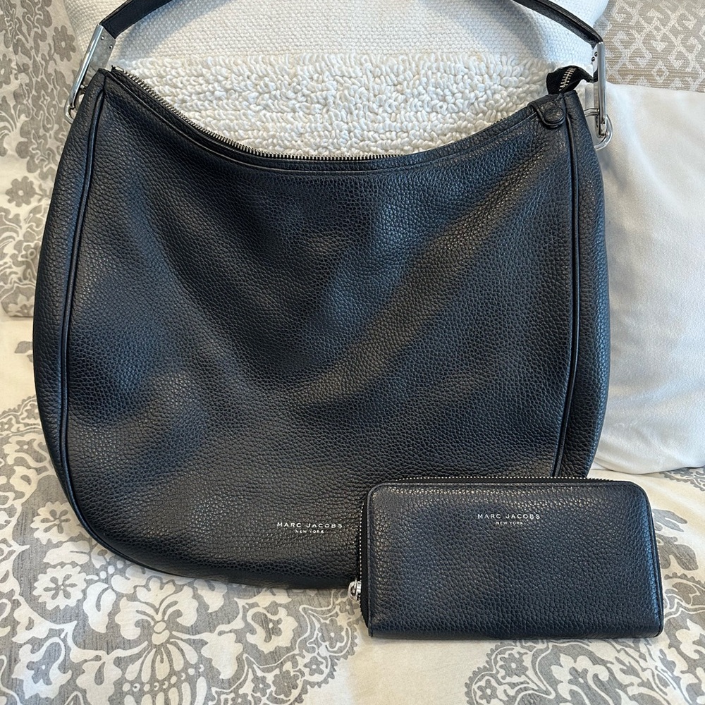 Marc Jacobs Black Hobo Bag with matching wallet. Sleek Leather Design